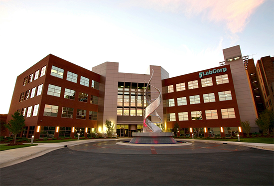 Labcorp building with a fountain sculpture in Burlington, North Carolina.